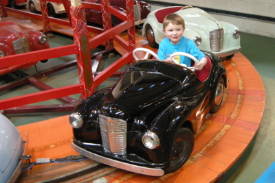 Car ride at Folly Farm Vintage Fair Theme Park in Wales